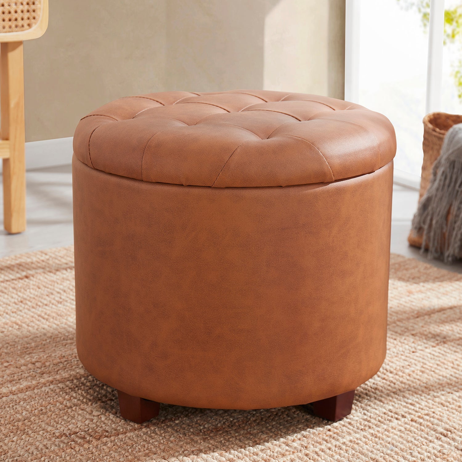 Donovan Round Tufted Faux Leather Storage Ottoman